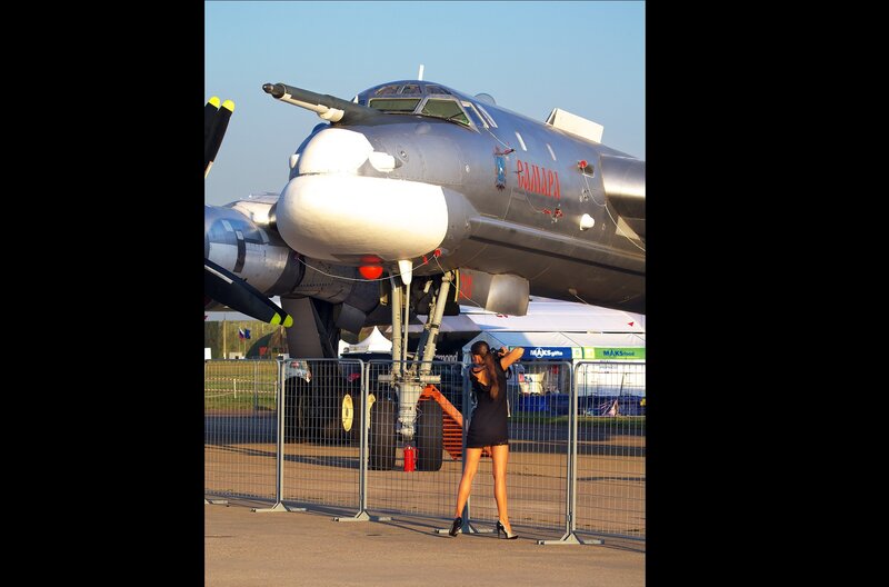 Woman Photographing Aircraft