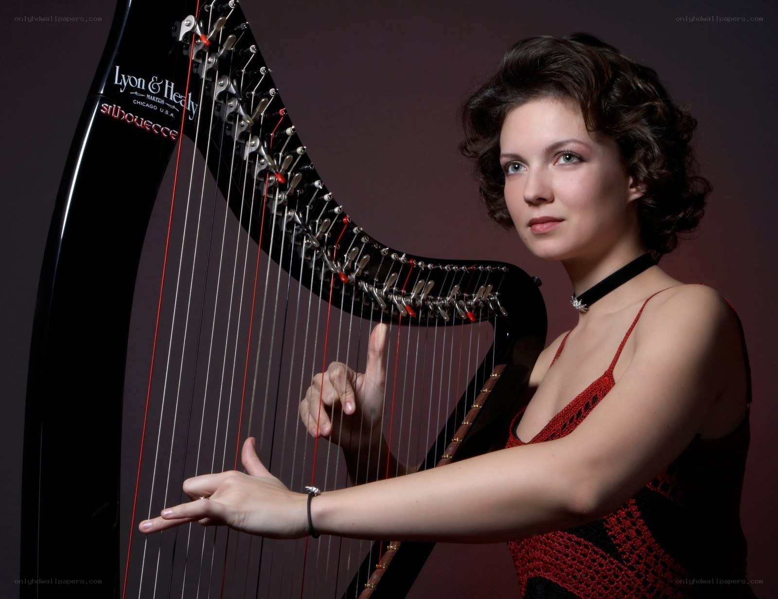 Woman playing a harp