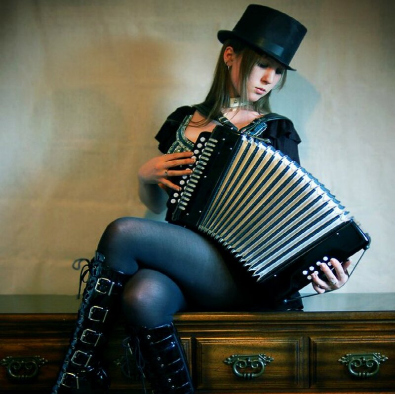 Woman Playing Accordion — Black, Dramatic
