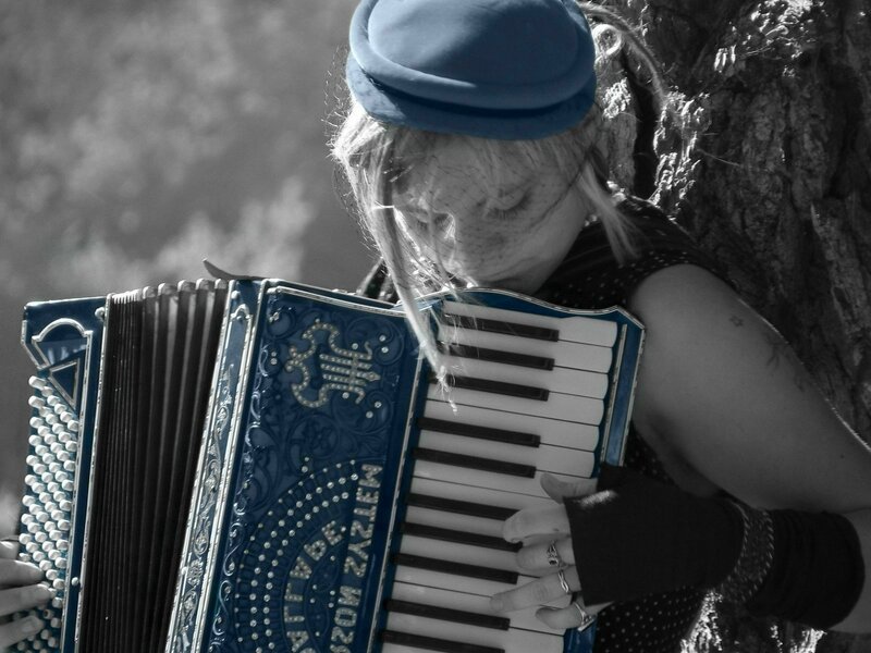 Woman Playing Accordion — Blue
