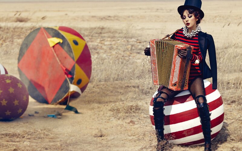 Woman Playing Accordion — Red, Dramatic, Afternoon