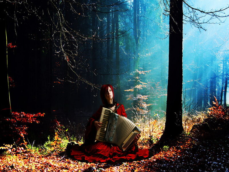 Woman Playing Accordion — Red, Dramatic