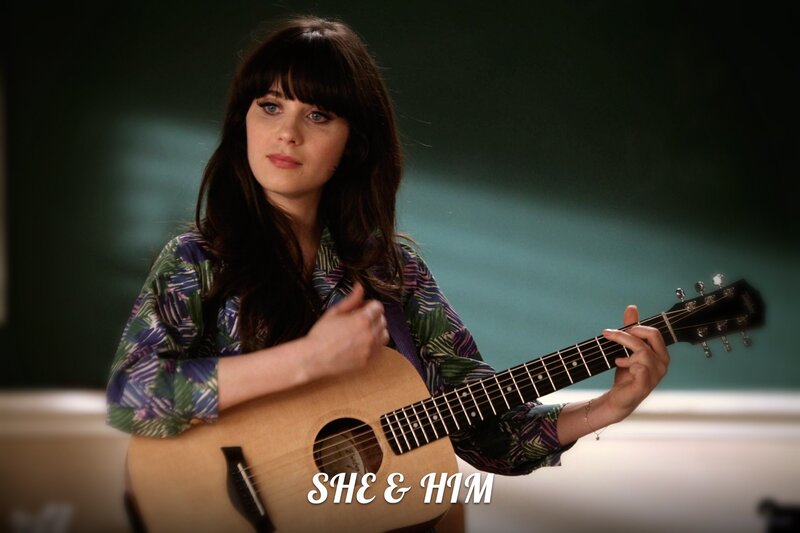 Woman playing acoustic guitar