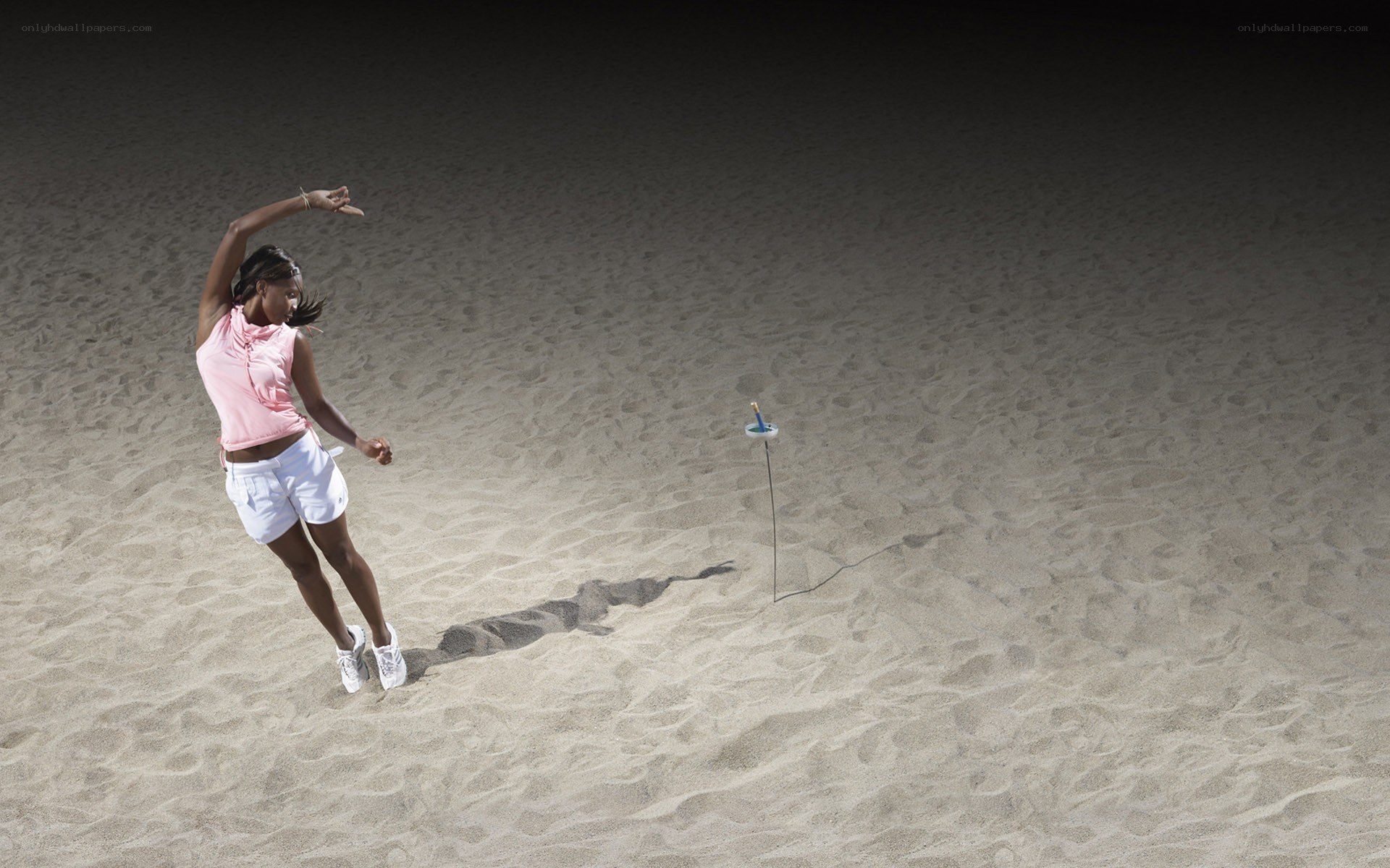 woman playing beach game