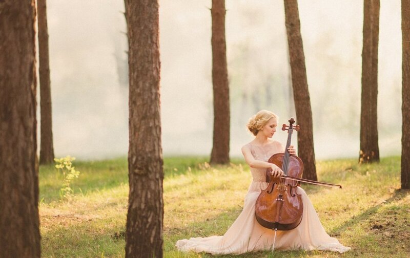 Woman Playing Cello — Beige