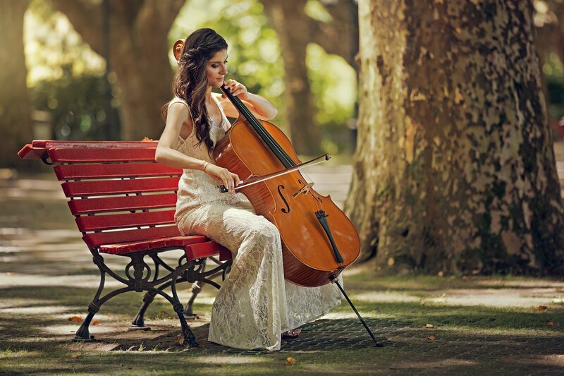 Woman Playing Cello — Red, Serene, Afternoon
