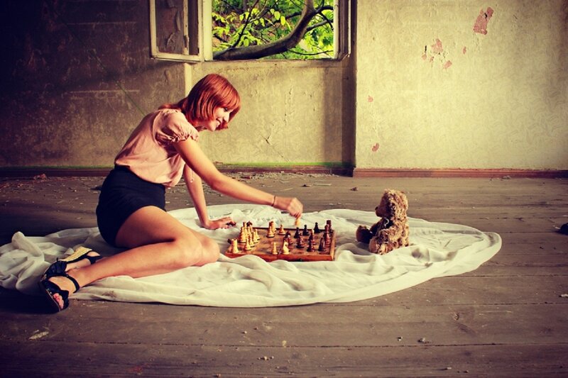 Woman Playing Chess — Brown