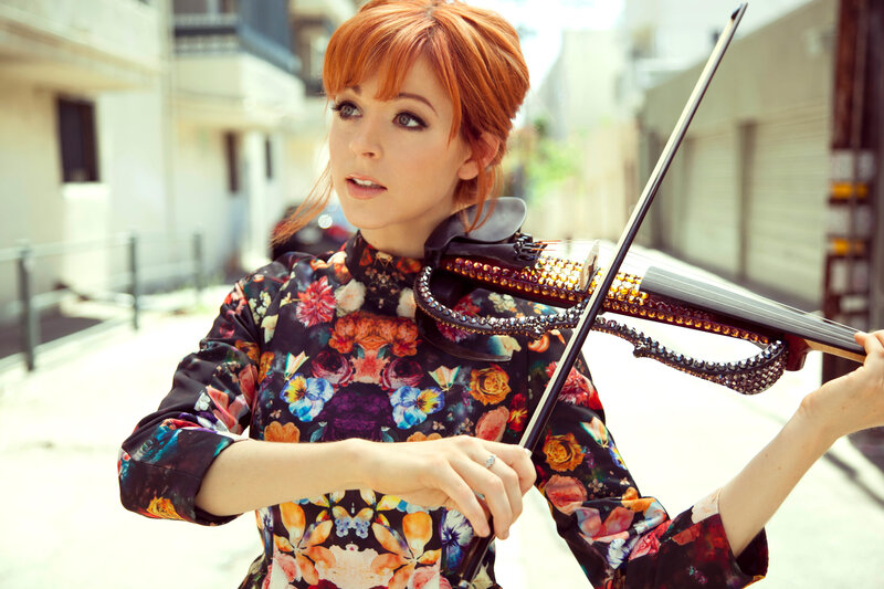 woman playing decorated violin