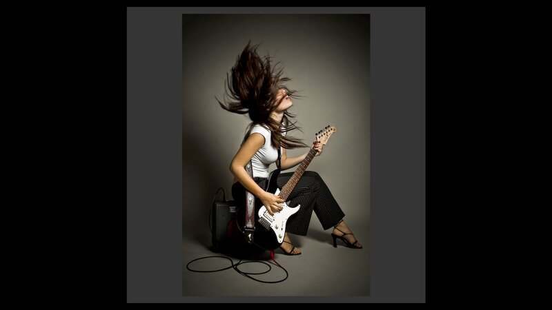 Woman Playing Electric Guitar — Gray