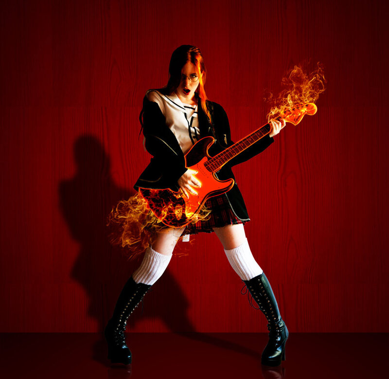 Woman Playing Flaming Guitar