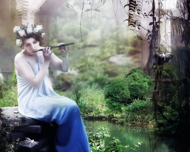 woman playing flute in garden