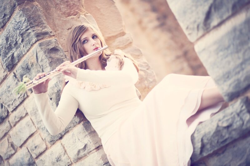 Woman Playing Flute — White, Serene, Afternoon