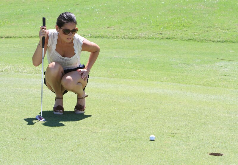Woman Playing Golf — Green