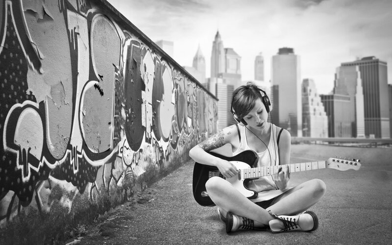Woman Playing Guitar — Black, Contemplative