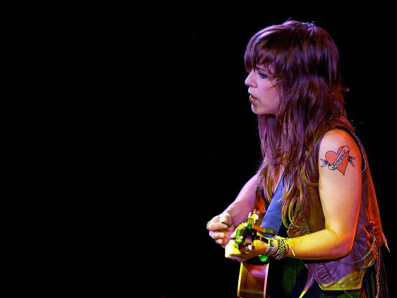 Woman Playing Guitar — Black, Dramatic