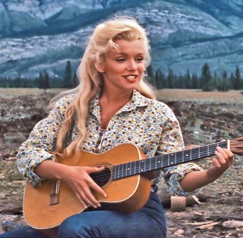 Woman Playing Guitar — Blonde