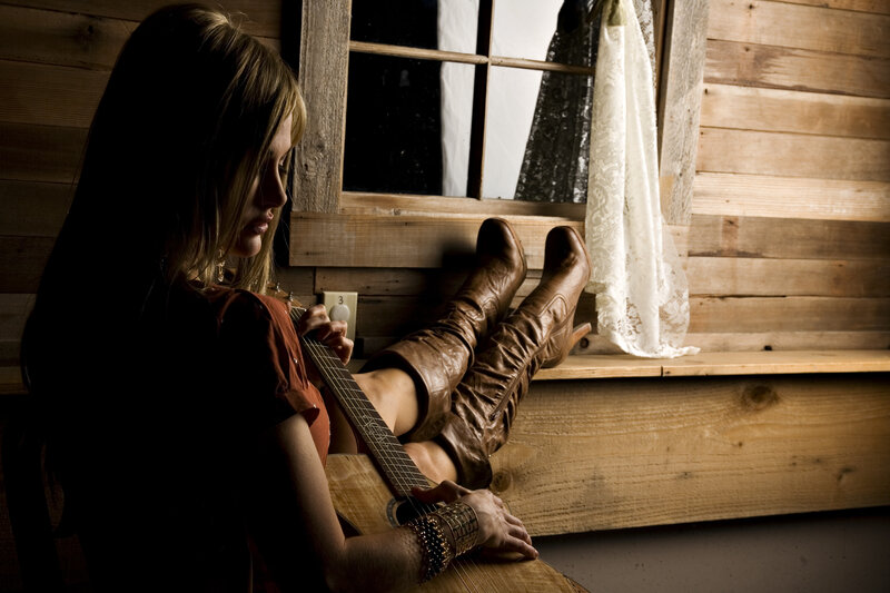 Woman Playing Guitar — Brown, Dramatic, Photograph