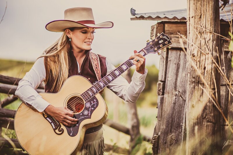 Woman Playing Guitar — Brown, Serene, Afternoon, Photograph
