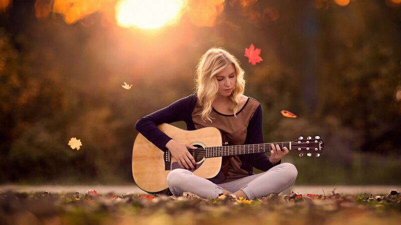 Woman Playing Guitar — Brown, Serene, Autumn, Photograph