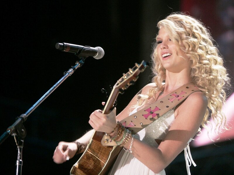 Woman Playing Guitar — White, Performing