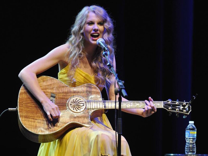 Woman Playing Guitar — Yellow, Performing