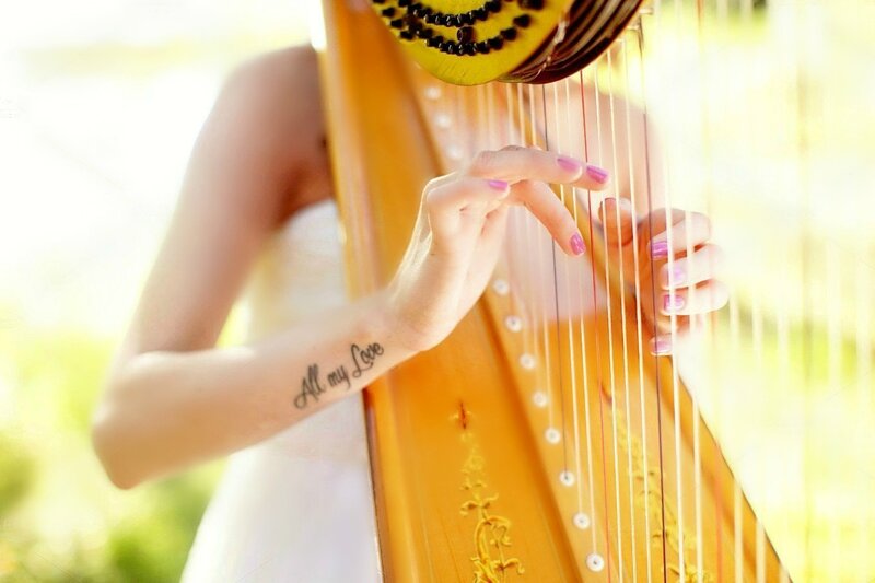 Woman Playing Harp — Yellow, Serene