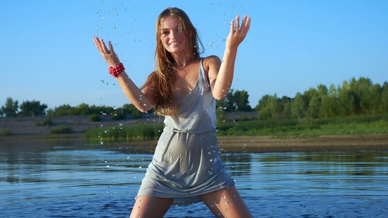 woman playing in water