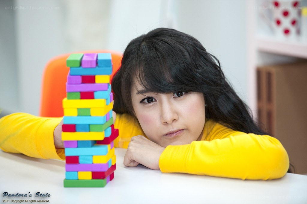 woman playing jenga game
