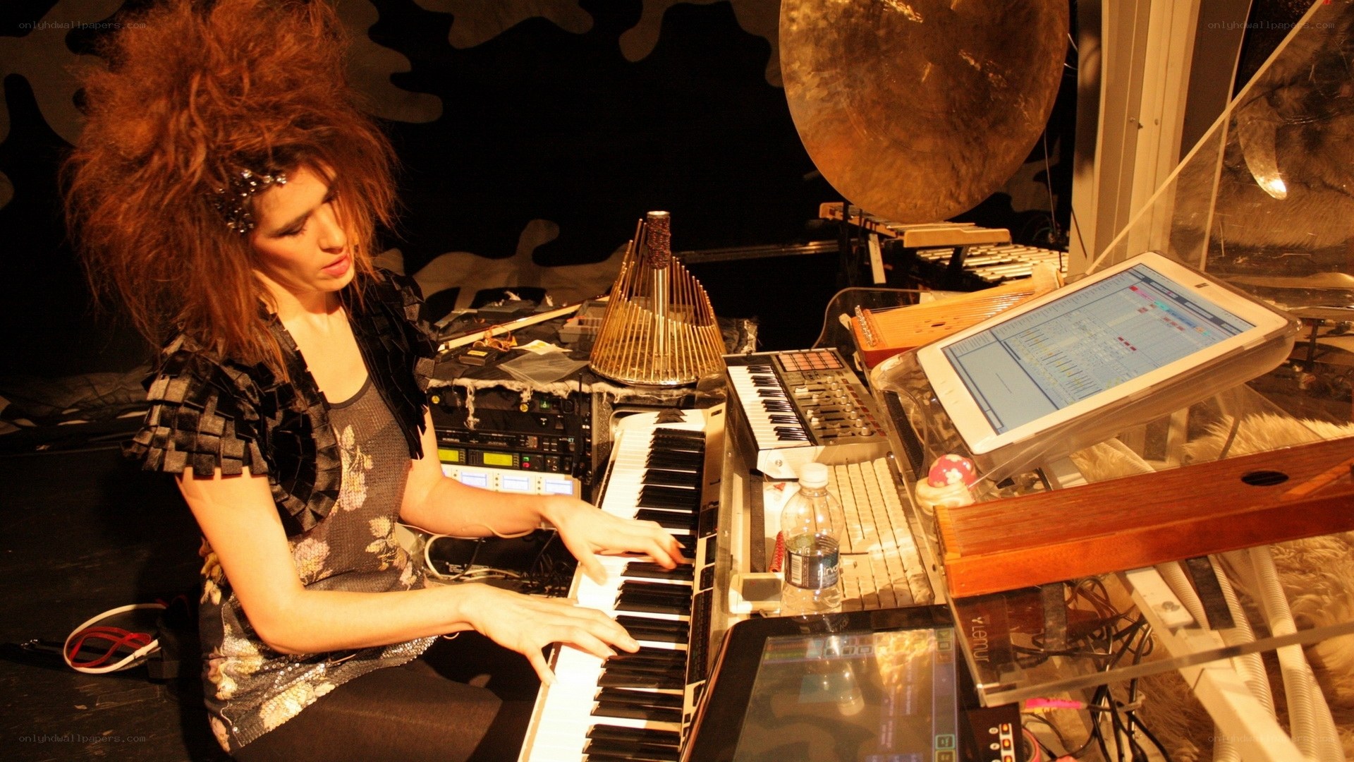 woman playing keyboard instrument