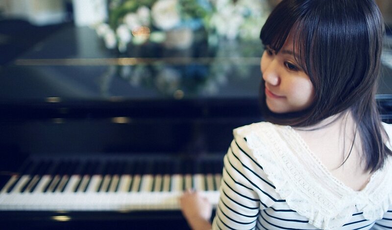 woman playing piano