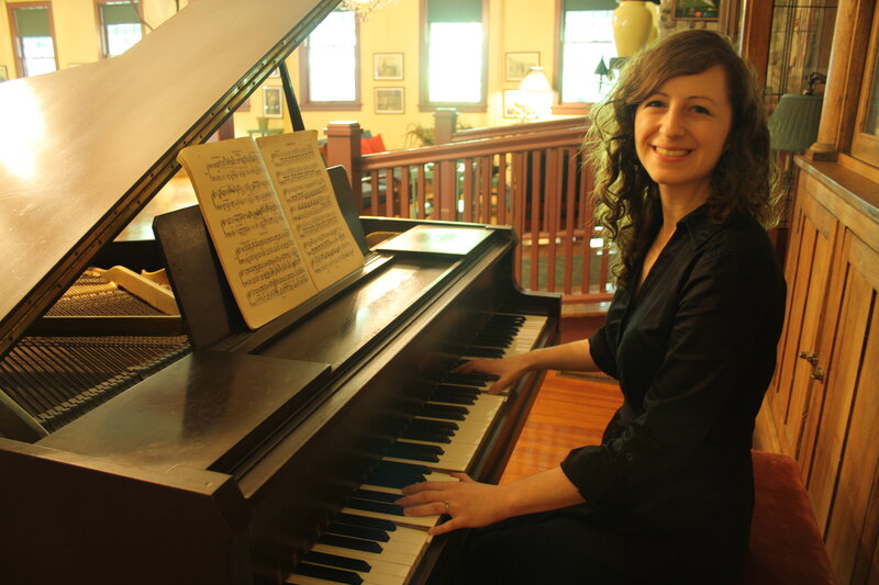 Woman playing piano at home