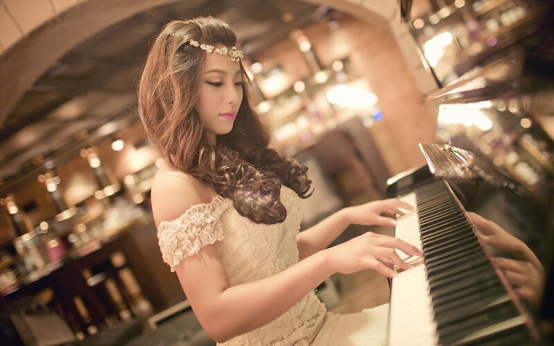 Woman Playing Piano — Beige