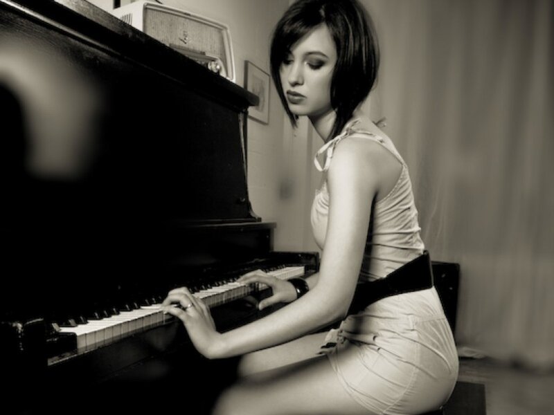 Woman Playing Piano — Black, Serious