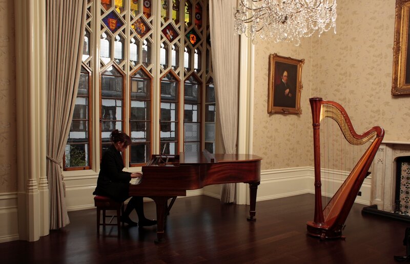 Woman Playing Piano — Brown, Serene