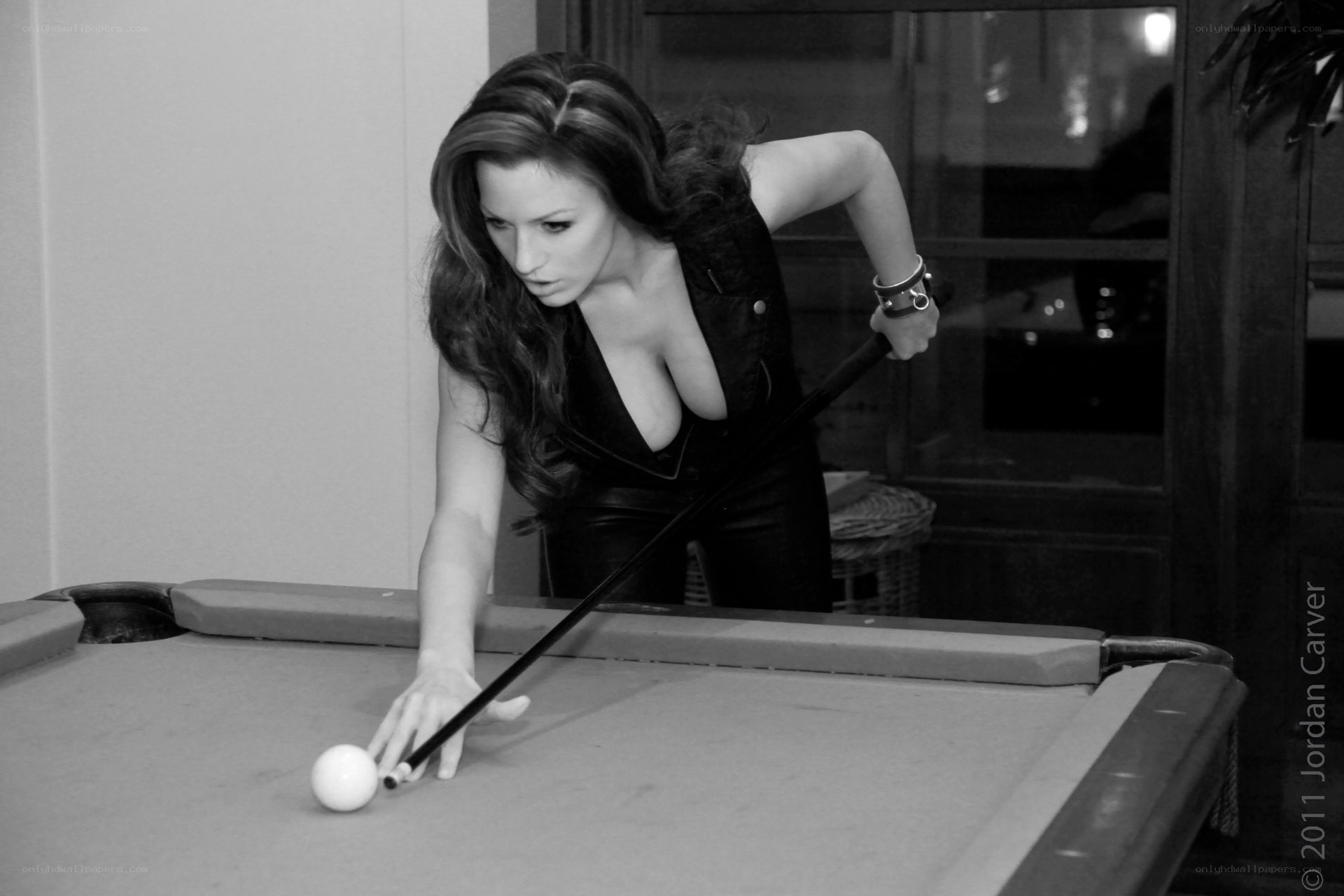 woman playing pool