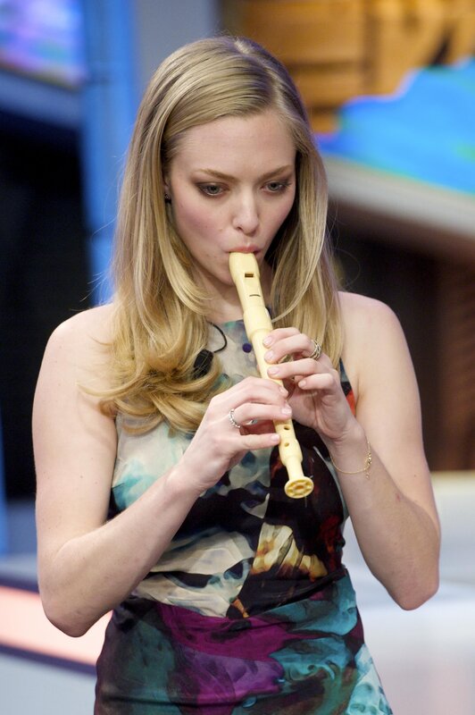 woman playing recorder