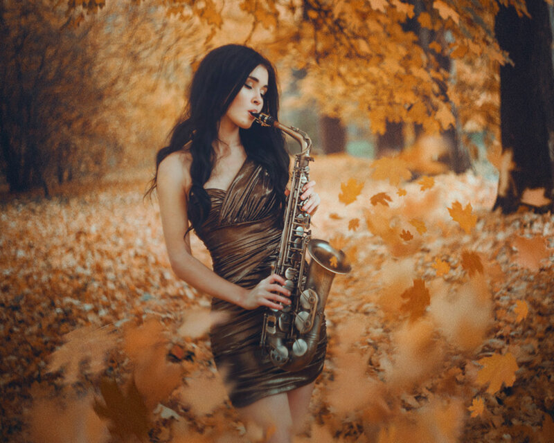 Woman Playing Saxophone — Brown