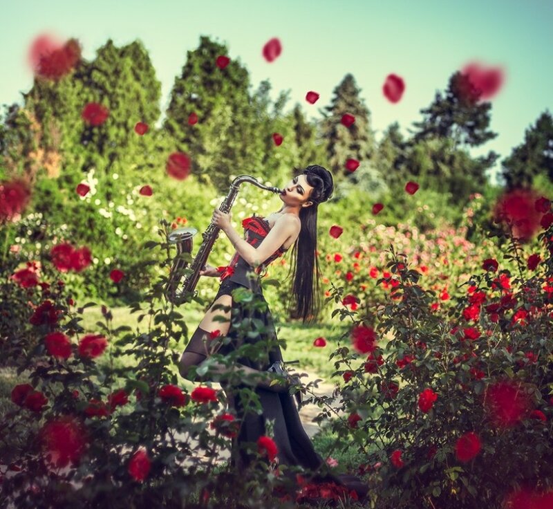 Woman Playing Saxophone — Red, Dramatic, Afternoon