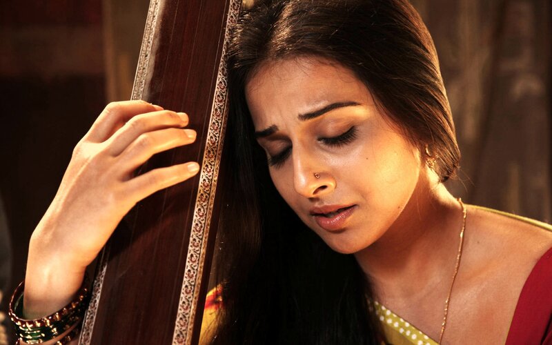Woman Playing Sitar