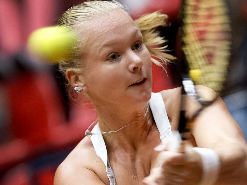 Woman Playing Tennis — White, Focused