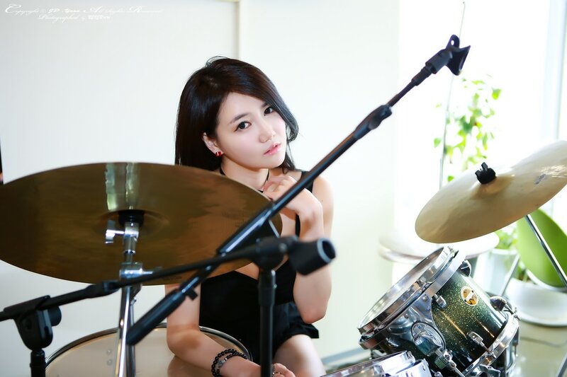 woman playing the drums