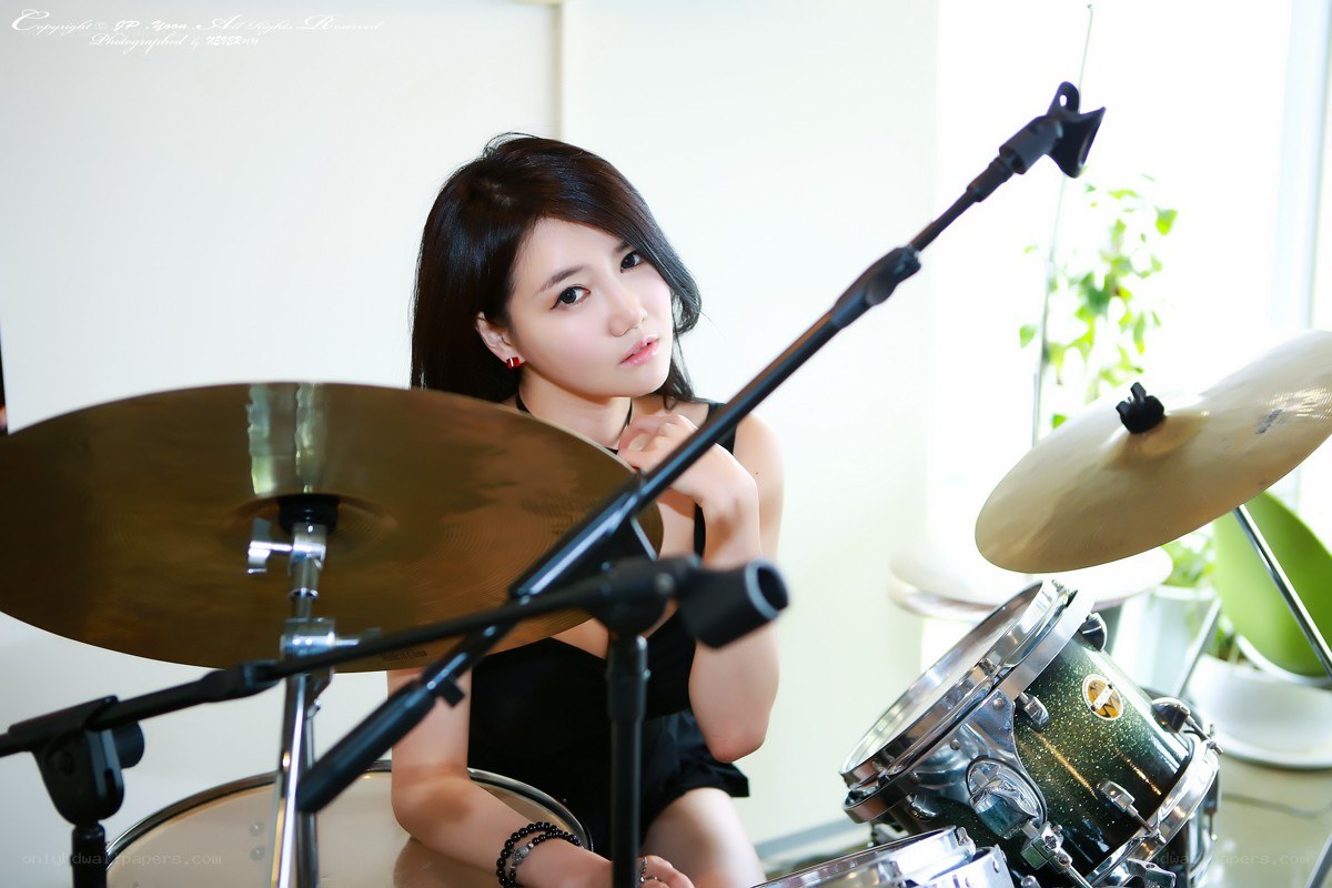 woman playing the drums