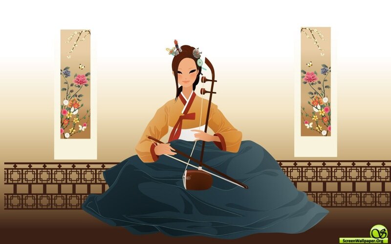 woman playing traditional korean instrument