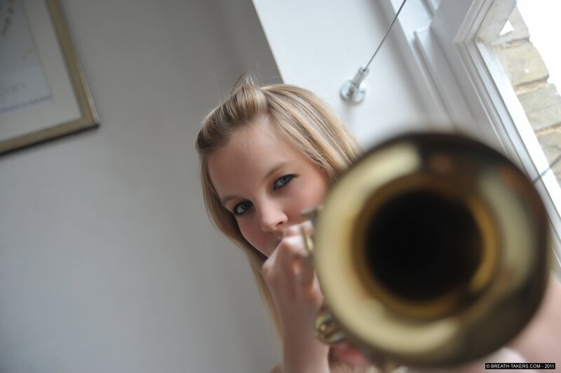 woman playing trumpet