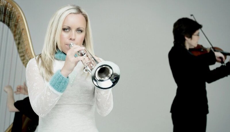 Woman Playing Trumpet — White, Focused