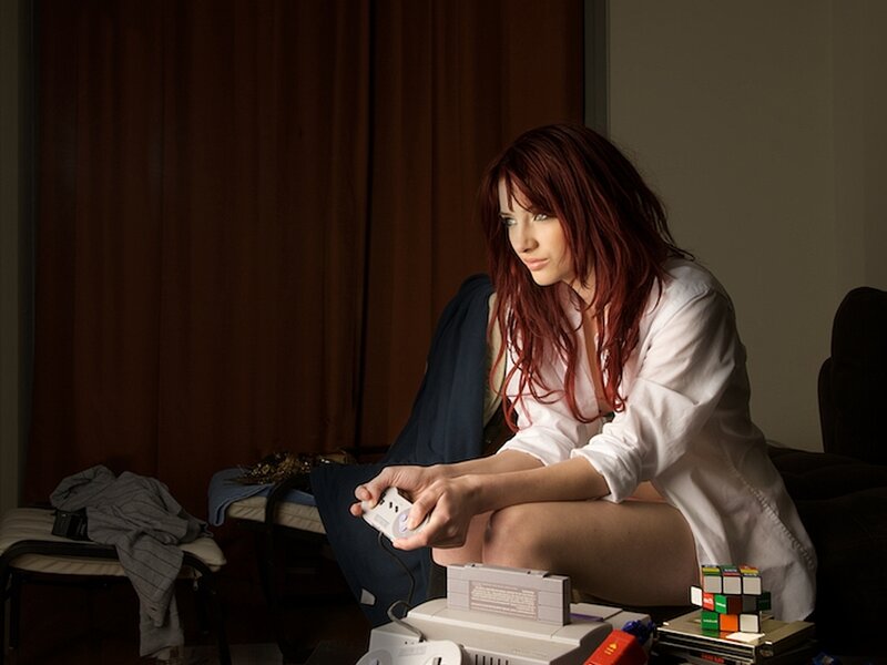 Woman Playing Video Game — White
