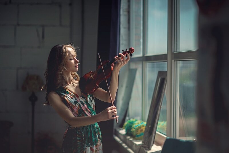 Woman Playing Violin — Green, Serene, Afternoon, Photograph