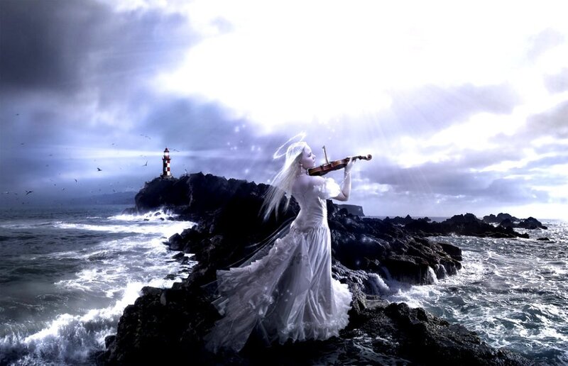Woman Playing Violin on Rocks