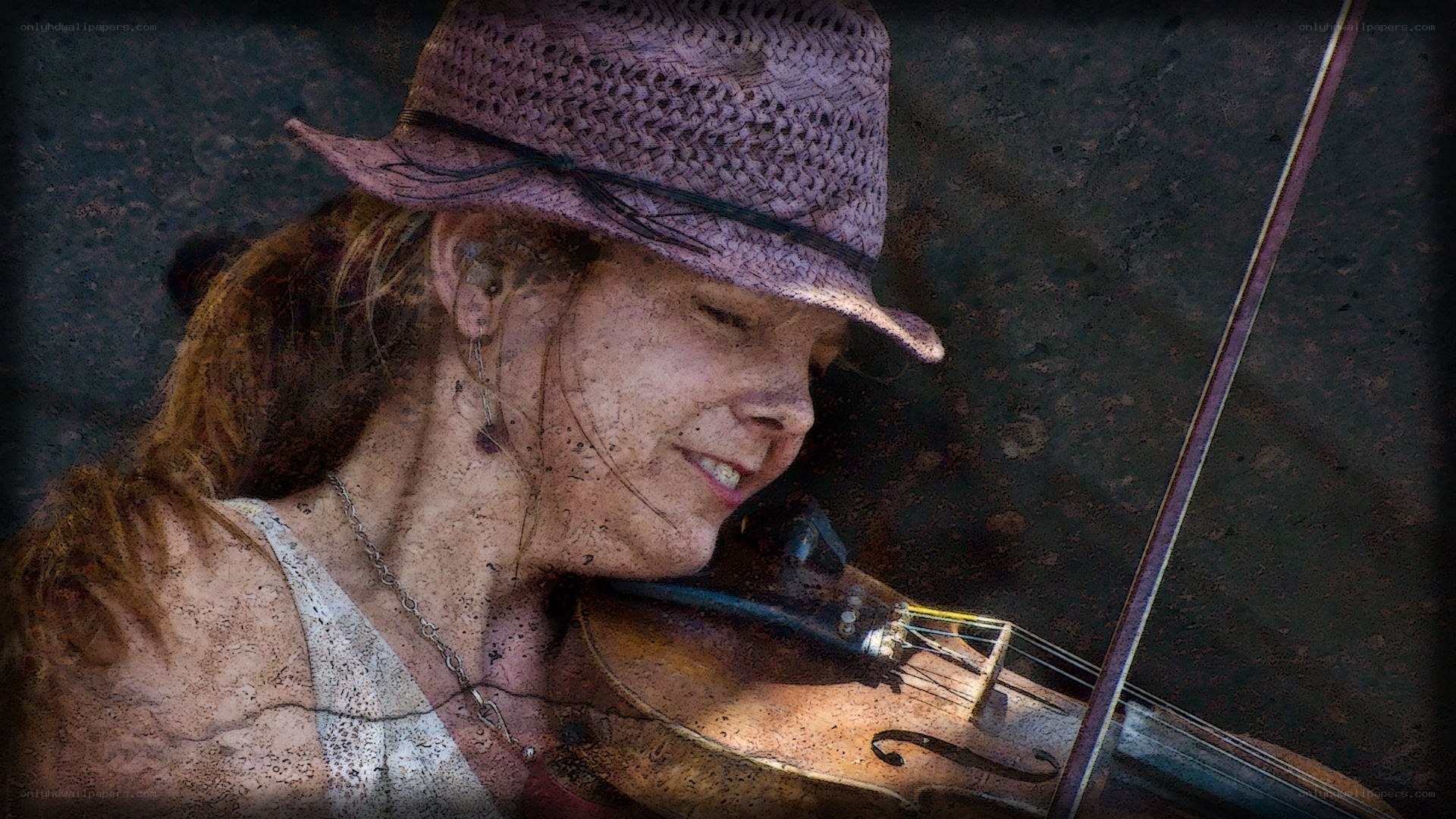 woman playing violin outdoors