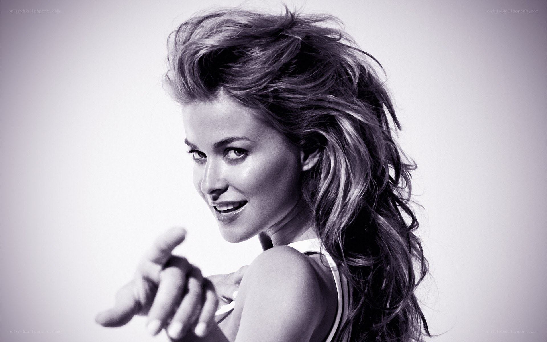 woman pointing at camera